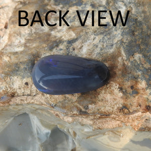 Lightning Ridge Natural Solid Black Opal with Blue Color.