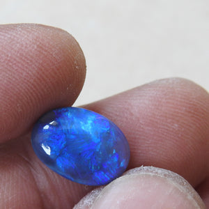 Solid Natural Black Opal from Lightning Ridge with Blue Green Colors.