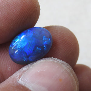 Solid Natural Black Opal from Lightning Ridge with Blue Green Colors.