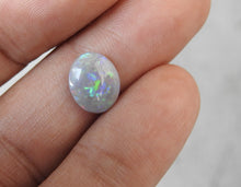 Load image into Gallery viewer, Lightning Ridge Solid Natural Polished Dark Opal with Multi-Color Fires.